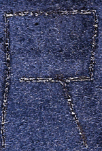 Close up of vector marking on a piece of steel.